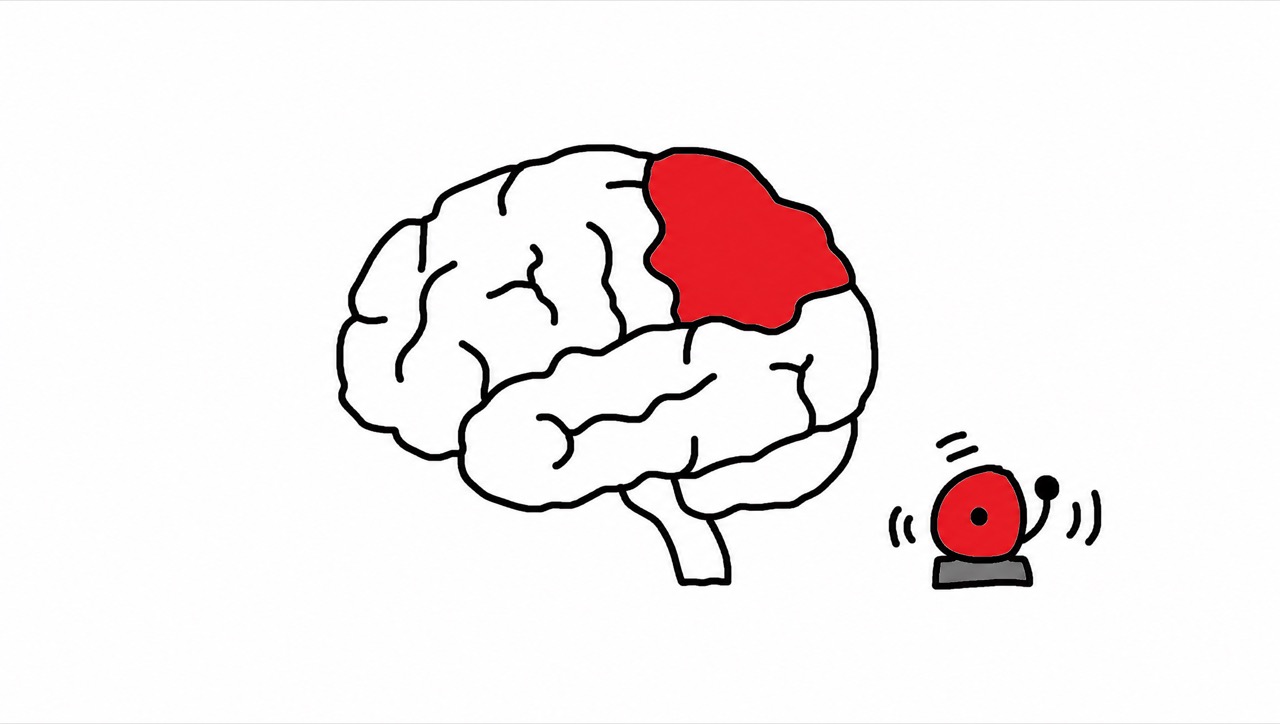 A crude drawing of a brain with one region coloured red and an alarm bell beside it